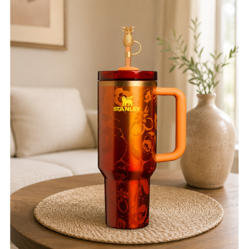 The Stanley 1913 x KAROL G 40 oz Quencher H2.O FlowState Tumbler
